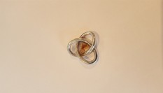 203 Oneindige knoop voor haren of as 203 Oneindige knoop voor haren of as